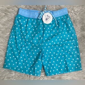 New with tags boys size 12 swim trucks in a bright color with palm tree design.